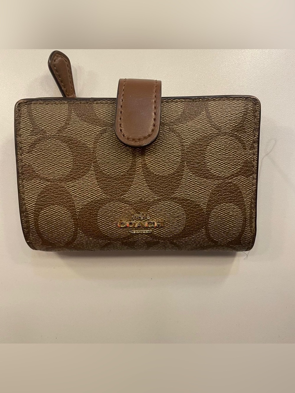 Coach Signature Canvas Compact Wallet in Brown and Tan